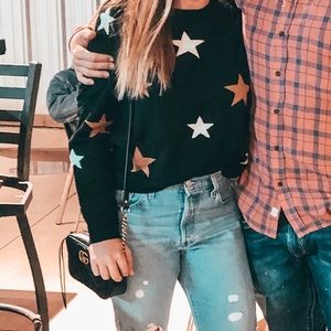 black sweater with stars